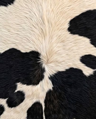 Black and white cowhide rug from the Signature Collection